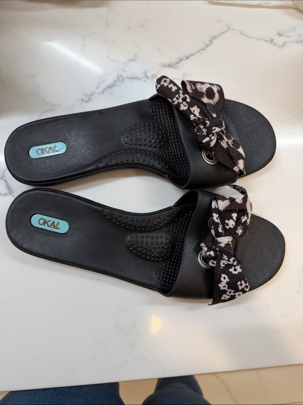 OKAb Milano Black Slide Sandals with Floral Bow Accent